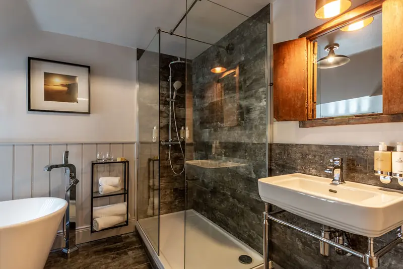 Ensuite bathroom with freestanding bath and walk-in shower