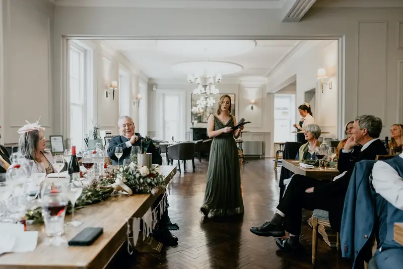 Wedding speech in the Beaumont function room with tall windows